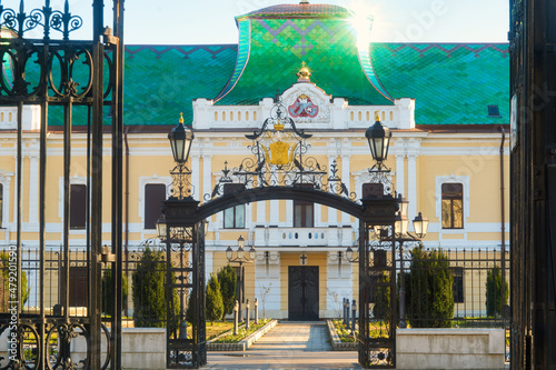 The main landmark of the beautiful Balkan city of Vrsac, located on the border between Serbia and Romania, is the magnificent palace of Orthodox Church Patriarcy and old historic cathedral photo