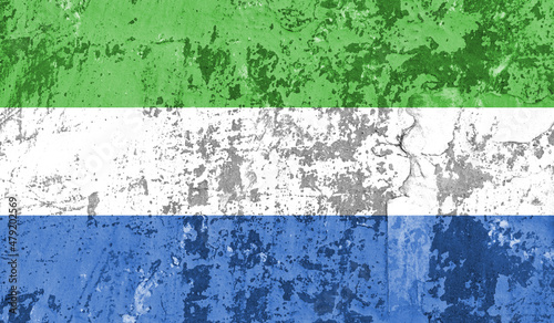 Sierra Leone flag on old paint on wall. 3D image