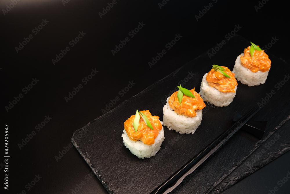 sushi rolls on a color background, minimalism
