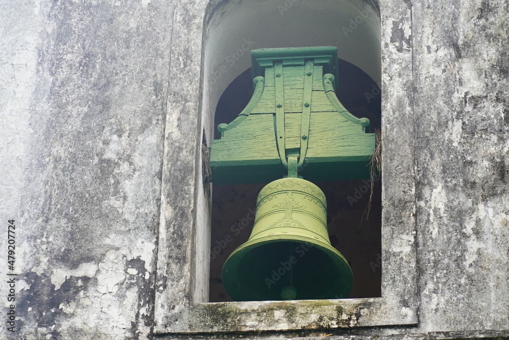 Obraz premium Old bell of the small church Santana Parish (Igreja da Freguesia de Santana), built in the year 1843, Angra dos Reis, Ihla Grande, state of Rio de Janeiro, Brazil