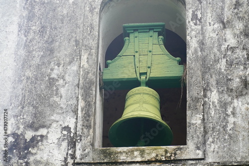Old bell of the small church Santana Parish (Igreja da Freguesia de Santana), built in the year 1843, Angra dos Reis, Ihla Grande, state of Rio de Janeiro, Brazil photo