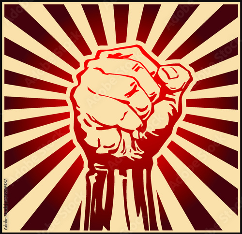 Vector illustration of strong raised fist in a ray red background in the style of soviet propaganda posters.