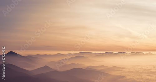 Majestic sunset in the mountains.The natural light of the sun fell on the horizon. © lesia