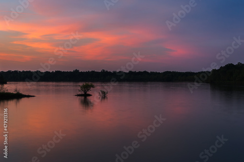 Beautiful colorful lake sunset. Location is Louisiana, USA © Victoria