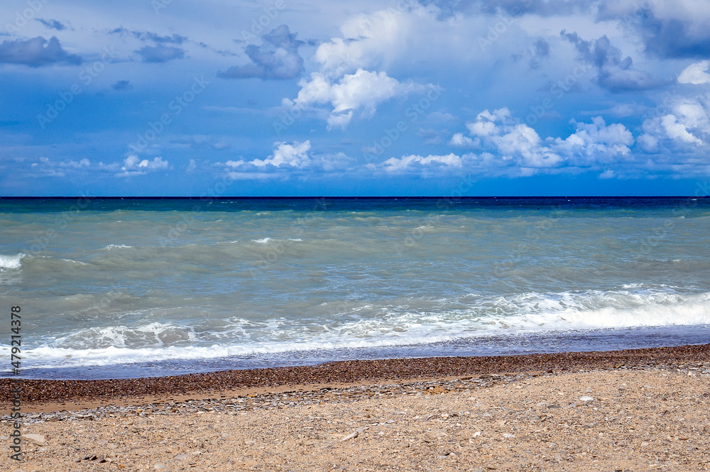 Cloudy sky over the sea. Beautiful seascape.