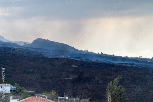 Lava flows of volcano Cumbre Vieja completely covering urban areas of the island