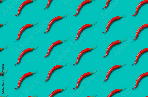 Seamless pattern of red chili pepper on pastel blue background. Flat lay minimal concept design illustration.