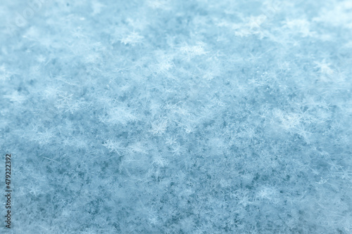 background of many snowflakes in white and blue