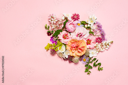 nice flowers on the pink background © Maksim Shebeko