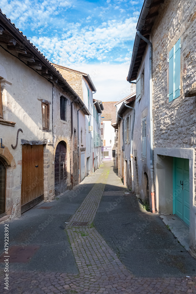 Cluny in France, ancient houses, small street in Burgundy

