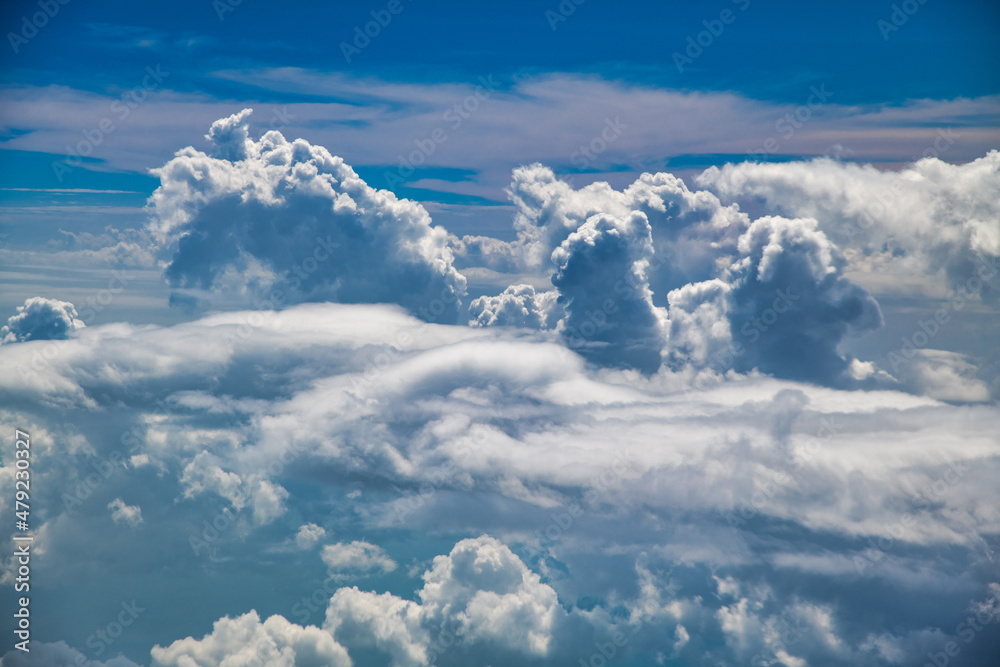 Giant clouds in the sky, view from the aircraft.
