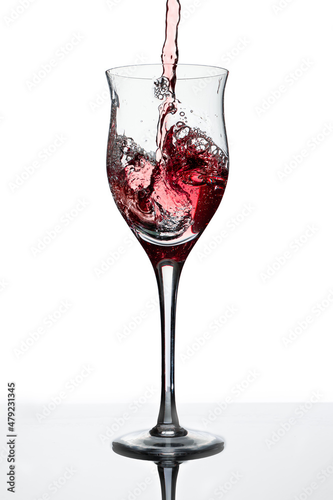 Serving a beautiful glass with a deliciuos red wine. White background, glass cup. Elegance, good taste, style concept. Serving a beautiful glass with a deliciuos red wine. White background, glass cup. Elegance, good taste, style concept.