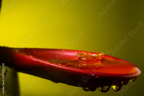 splash photo on spoon with water
