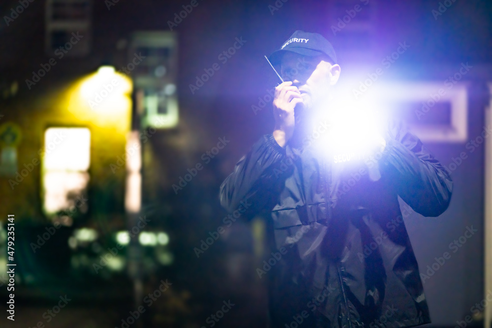 Security Guard Officer Using Walkie-Talkie Radio Security Guard Officer Using Walkie-Talkie Radio