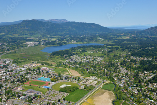 Aerial photograph of the Duncan Sportsplex with Somenos Lake in the background, Cowichan Valley, Vancouver Island, British Columbia, Canada. photo