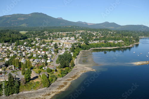 Aerial photo of Kinsmen Beach Park and the boat launch at the end of Maple Street in Chemainus, Vancouver Island, British Columbia, Canada. photo