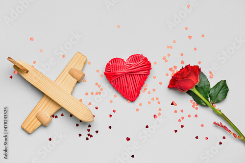 Wooden airplane, heart, ros...