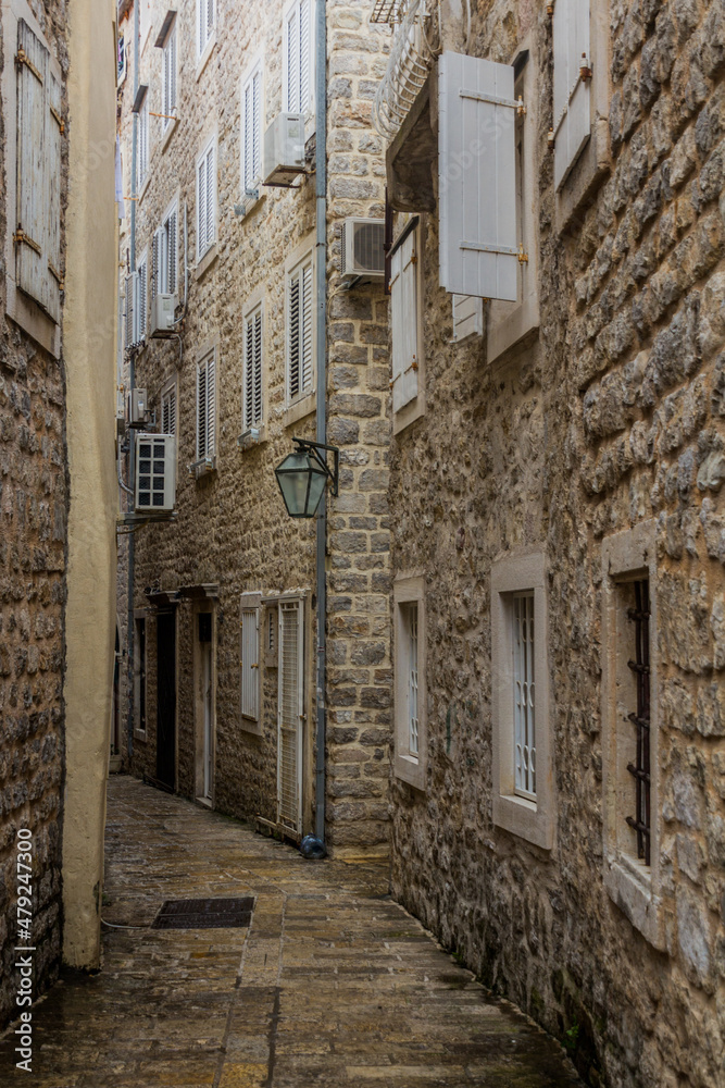 Narrow alley in Budva town, Montenegro.
