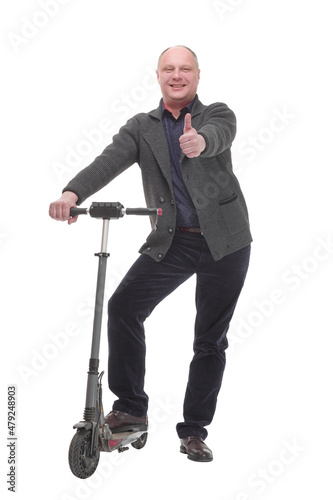 happy casual man with electric scooter .isolated on a white background.