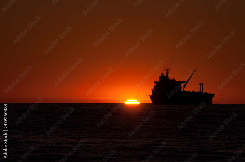 Anchored boat at Sunset 