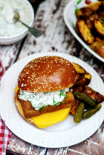 Fillet-o-fish and chips with tartare sauce.