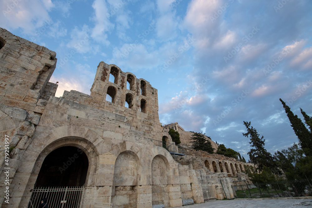 Evening sky with clouds against the background of the ruins of ancient greek architecture