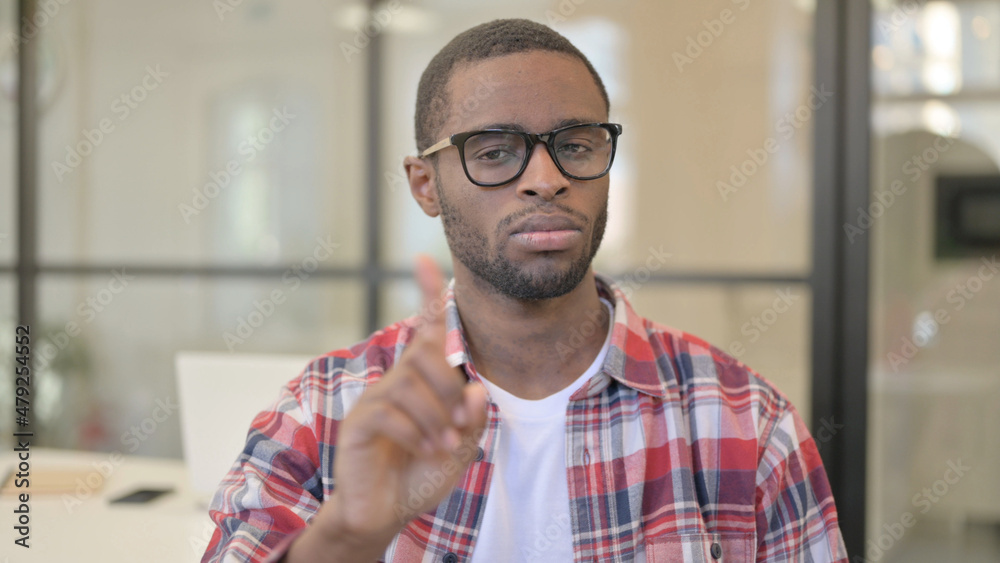 Obraz premium Portrait of African Man Showing No Sign by Finger, Denial
