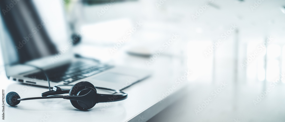 Headset and customer support equipment at call center ready for actively service . Corporate business help desk and telephone assistance concept . - obrazy, fototapety, plakaty 