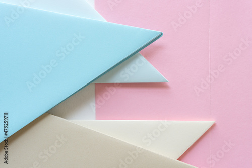 folded paper - beige and blue on pink