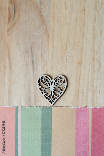 blank space with paper and fancy wooden heart