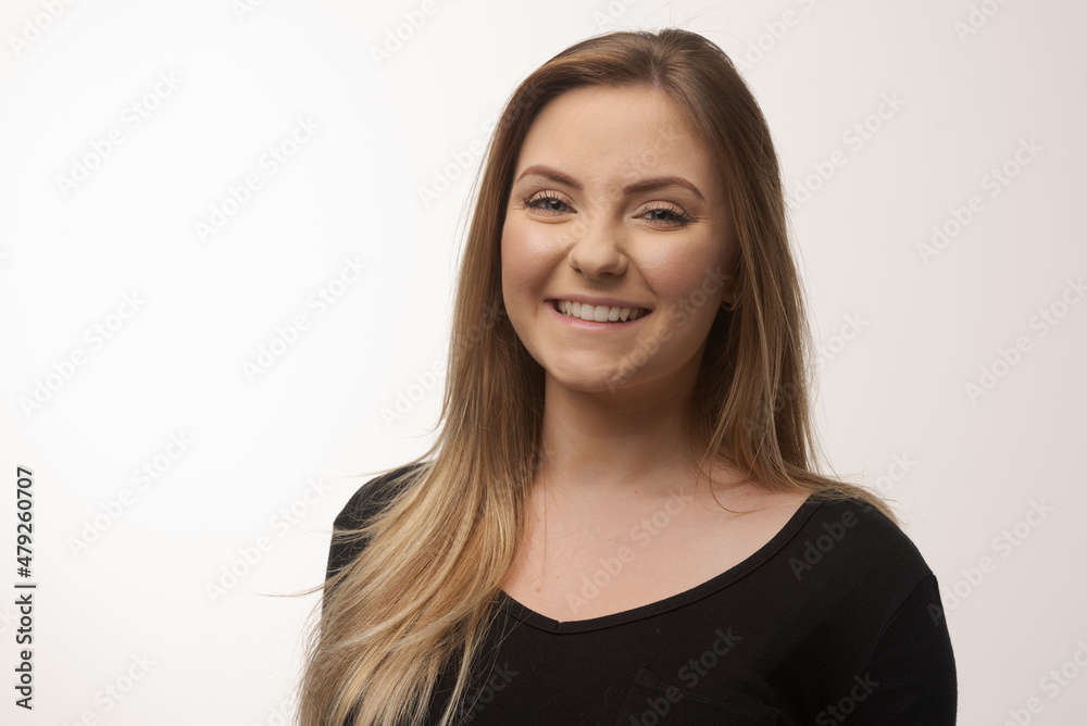 Young blonde woman isolated in studio portrait Young blonde woman isolated in studio portrait