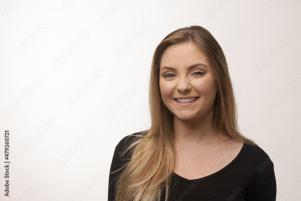 Young blonde woman isolated in studio portrait Young blonde woman isolated in studio portrait
