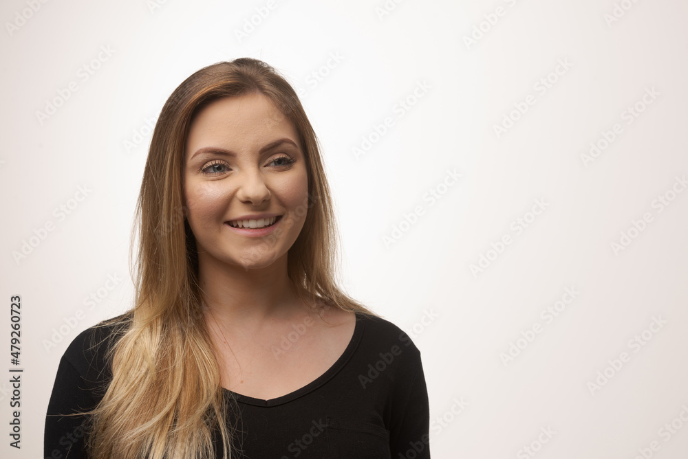 Obraz premium Young blonde woman isolated in studio portrait