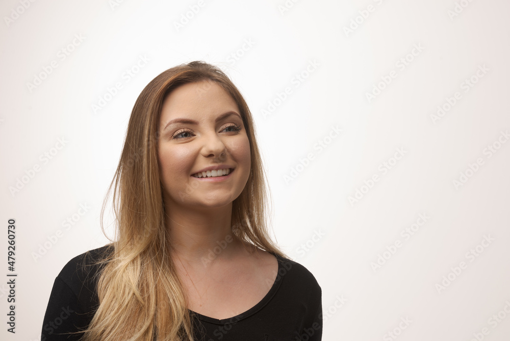 Young blonde woman isolated in studio portrait Young blonde woman isolated in studio portrait