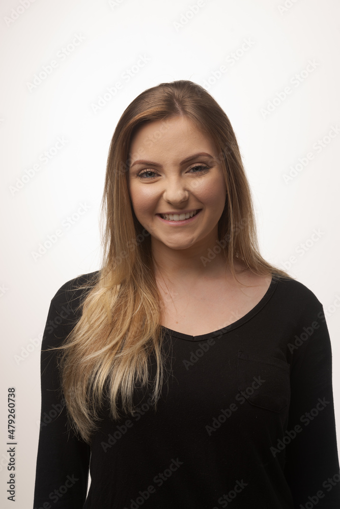 Young blonde woman isolated in studio portrait Young blonde woman isolated in studio portrait