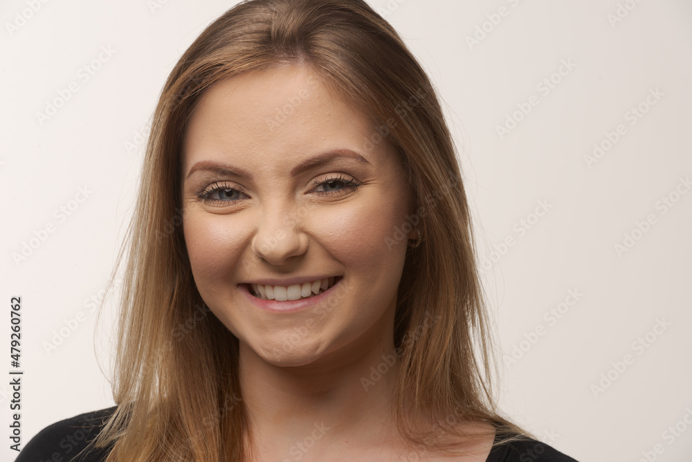 Young blonde woman isolated in studio portrait Young blonde woman isolated in studio portrait