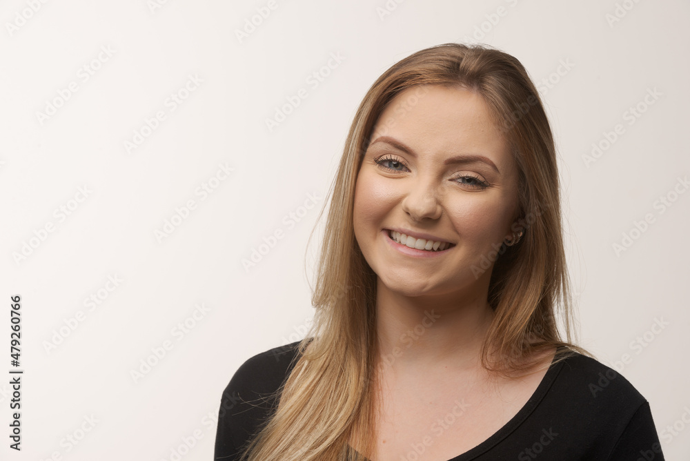 Young blonde woman isolated in studio portrait Young blonde woman isolated in studio portrait