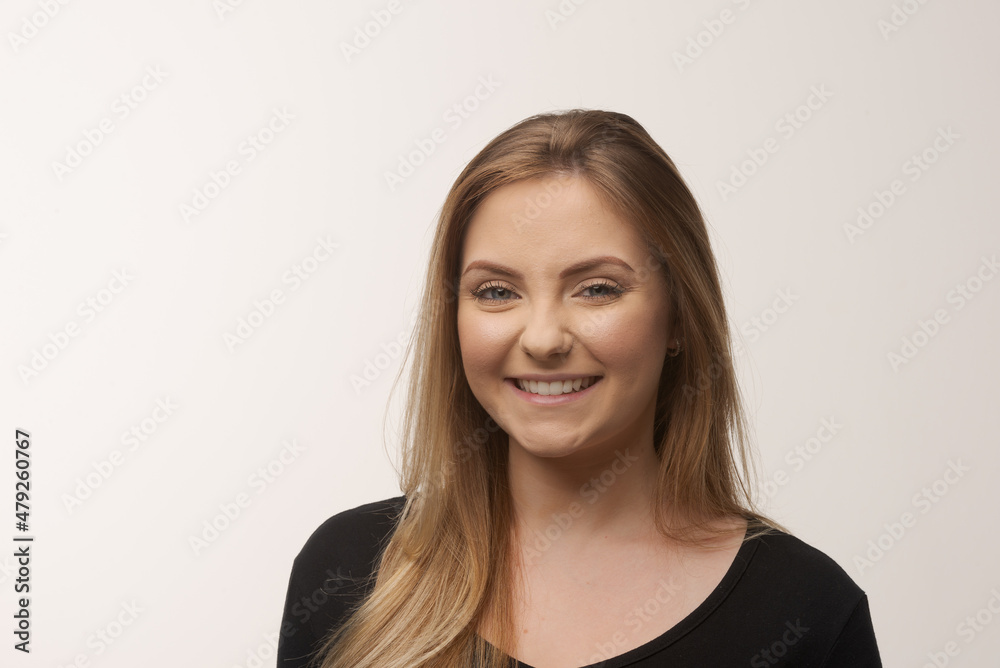 Young blonde woman isolated in studio portrait Young blonde woman isolated in studio portrait