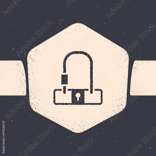 Grunge Bicycle lock U shaped industrial icon isolated on grey background. Monochrome vintage drawing. Vector