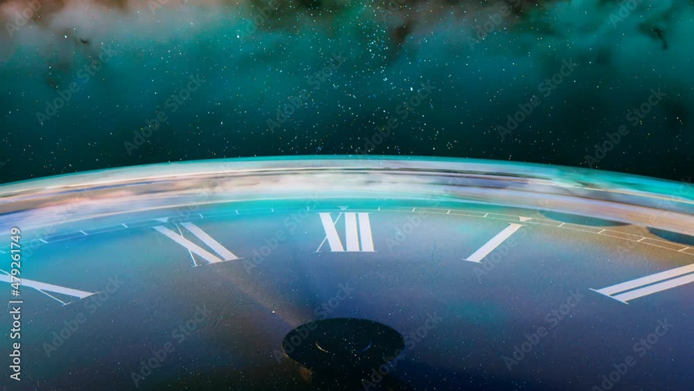 The clock face of the old shiny watch on the beautiful starry sky. Time travel