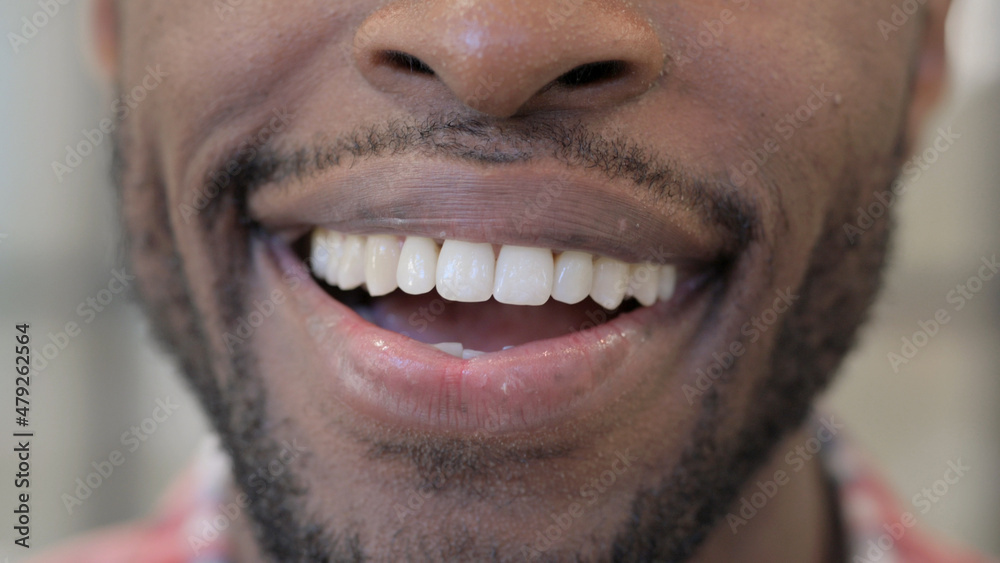 Close up of Smiling Lips of African Man Close up of Smiling Lips of African Man