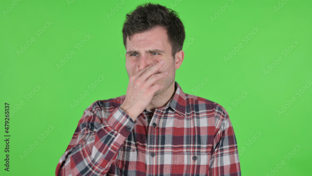 Portrait of Young Man having Bad Odor, Green Chroma Screen Portrait of Young Man having Bad Odor, Green Chroma Screen