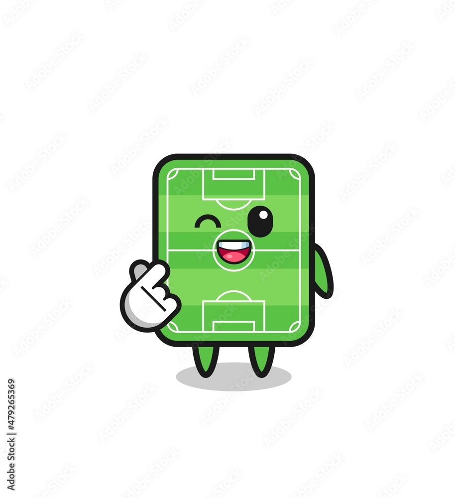 football field character doing Korean finger heart