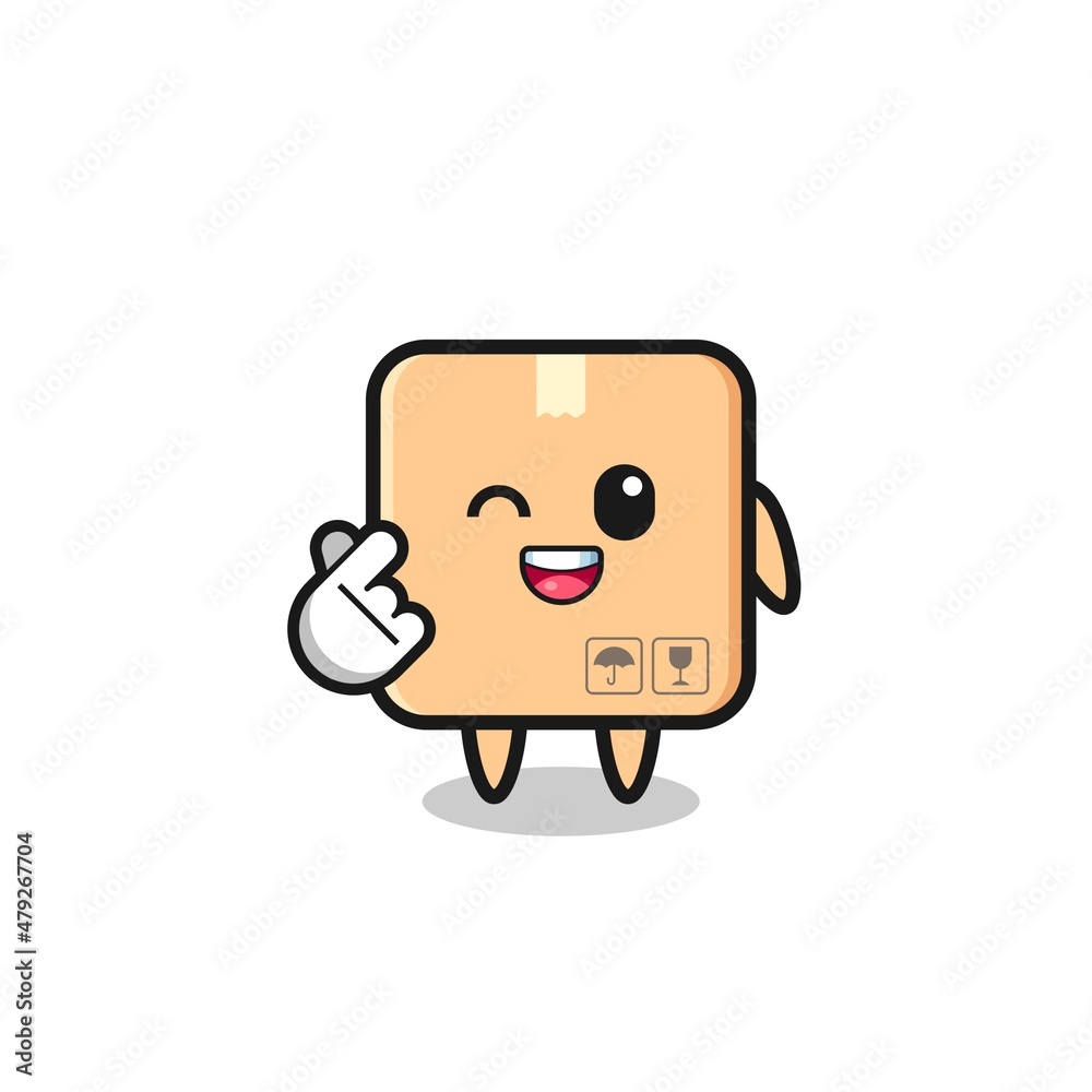 cardboard box character doing Korean finger heart