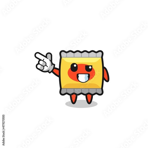 snack mascot pointing top left