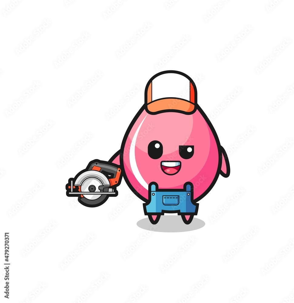 the woodworker strawberry juice drop mascot holding a circular saw the woodworker strawberry juice drop mascot holding a circular saw