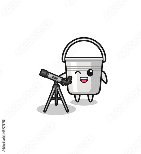 metal bucket astronomer mascot with a modern telescope