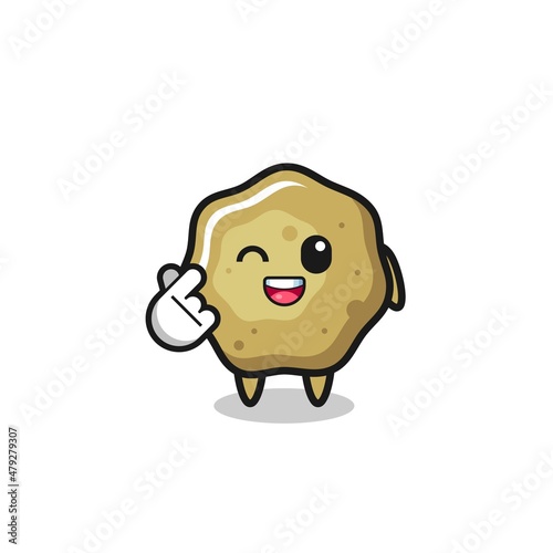 loose stools character doing Korean finger heart