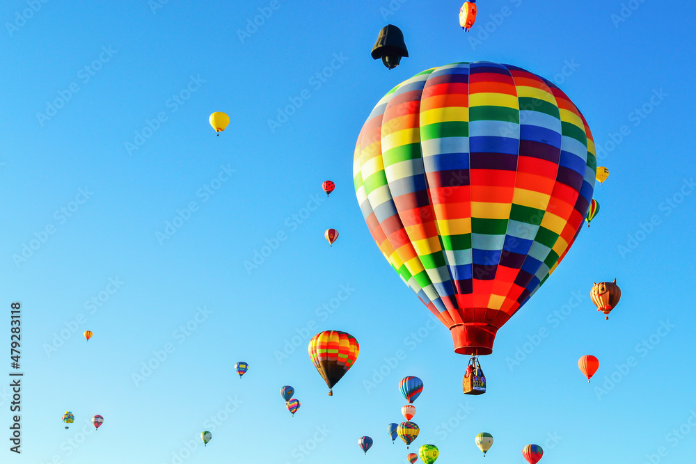 Fototapeta premium A lot balloons, hot air flying in the blue sky. Festival balloons, hot air Mexico.
