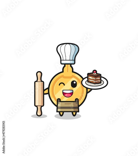 key as pastry chef mascot hold rolling pin